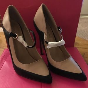 Black and Tan high heeled pumps.